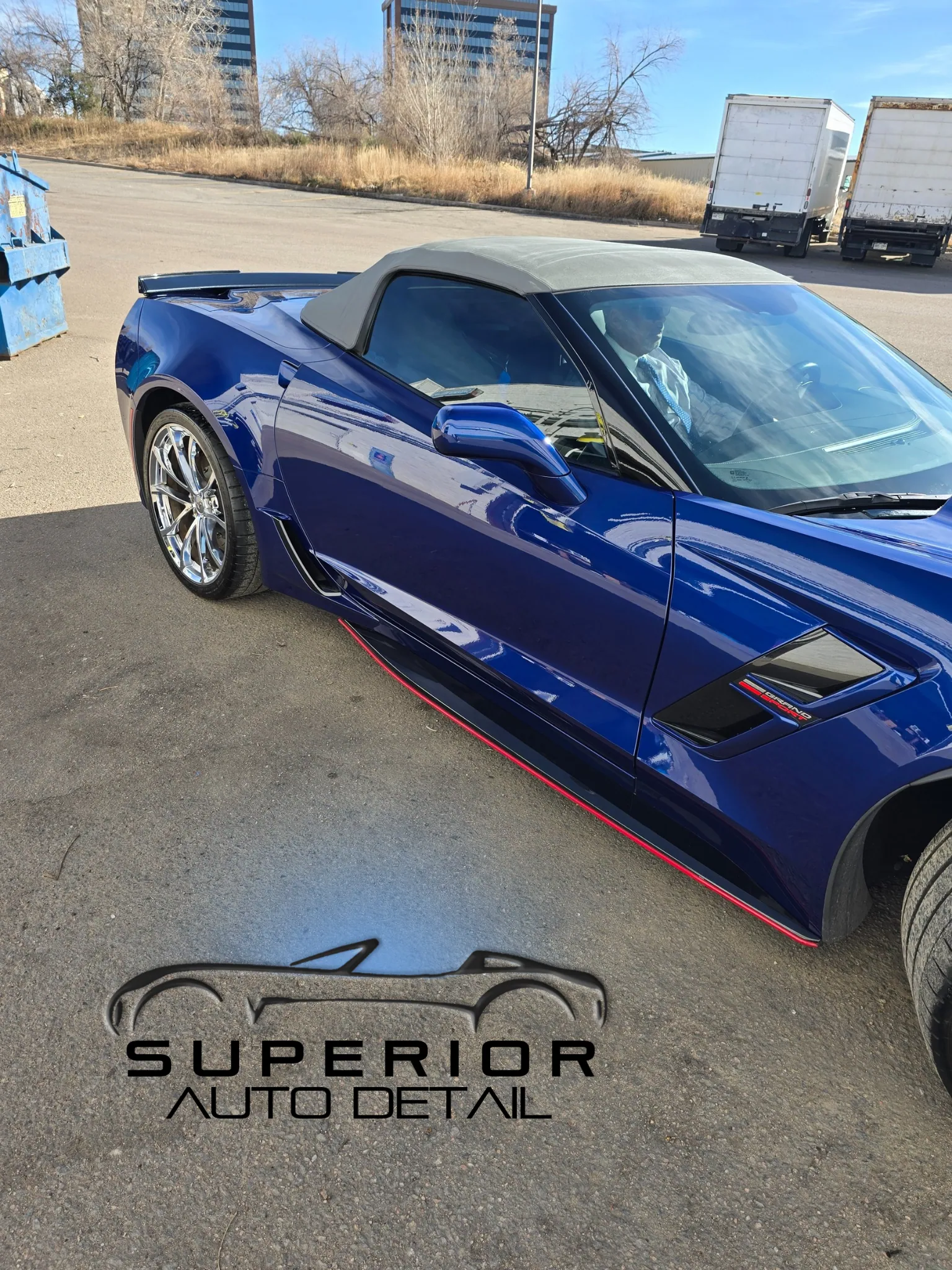 Blue Corvette convertible outside Superior Auto Detail